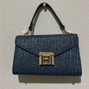 Elegant Blue Handbag with Gold Accents